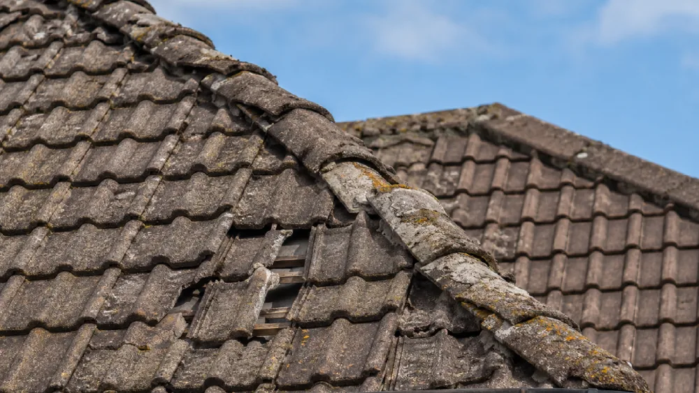 Slate roof restoration and lead flashing assessment